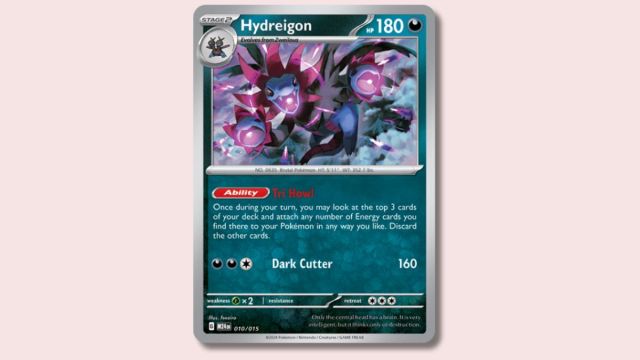 Hydreigon Pokémon card on a pink background.