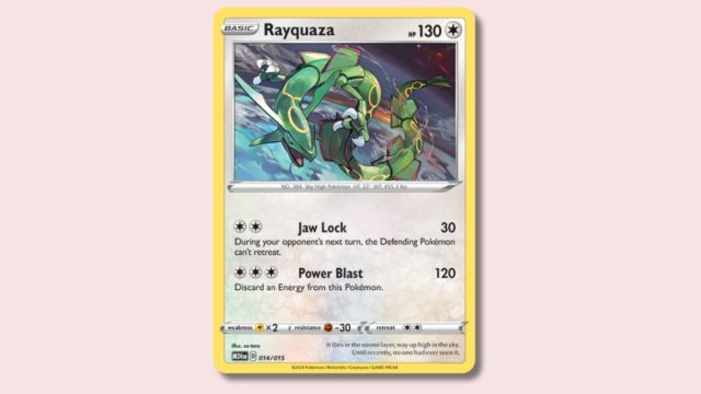 Rayquaza Pokémon card on a pink background.